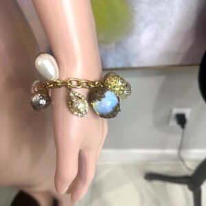 Elegant Gold and Blue Charm Bracelet